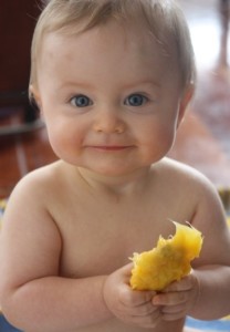 Baby Eating mango fruit -Mango seeds 