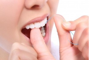 floss daily and massage your gums